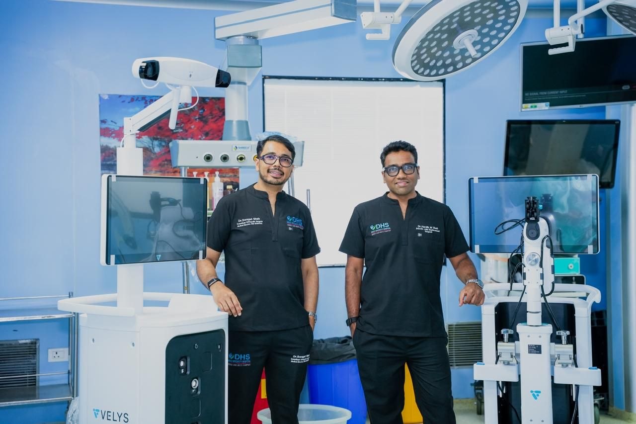 Dr. Hardik M Shah and Dr. Swagat M Shah with the VELYS 4.0 Robotic-Assisted Solution from Johnson & Johnson at DHS Multispecialty Hospital